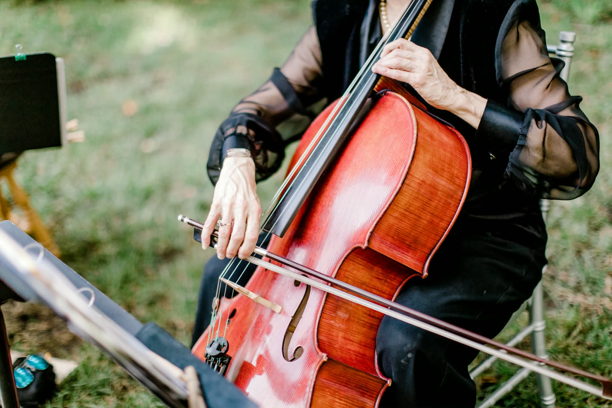 Barbara playing cello outdoors